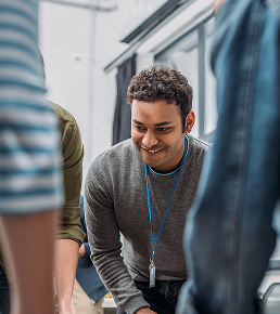 cropped-image-of-colleagues-playing-in-table-socce-2023-11-27-05-00-55-utc 1
