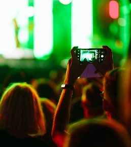 hand-with-a-phone-records-live-music-festival-peo-2023-11-27-05-08-42-utc 1